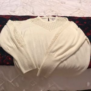 sweater with cut out neck and sleeves